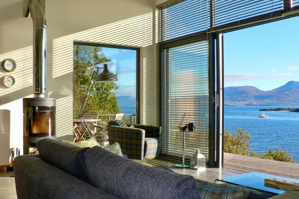 Floor to ceiling retractable glass doors allow uninterrupted views...